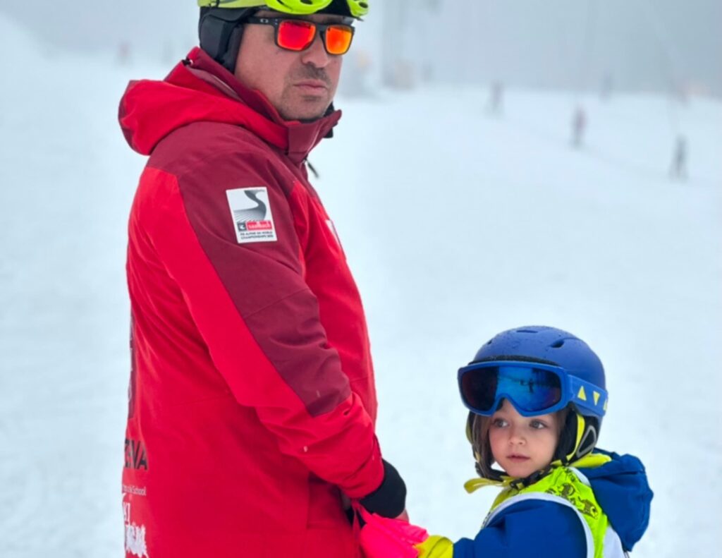 Barzena Ski instructor with a young skier on the slopes